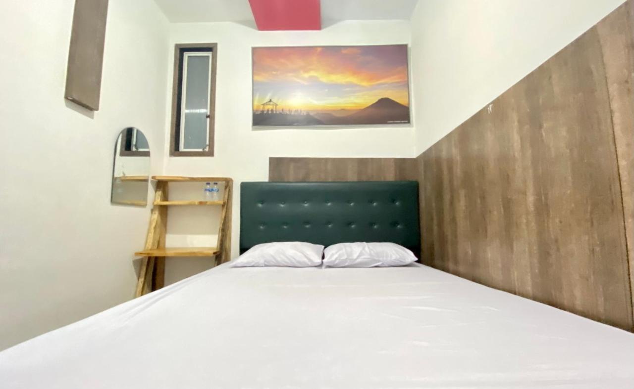 Homestay Batu Kelir Syariah Dieng Mitra Reddoorz Diyeng Exterior photo
