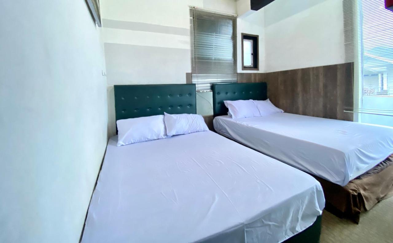 Homestay Batu Kelir Syariah Dieng Mitra Reddoorz Diyeng Exterior photo