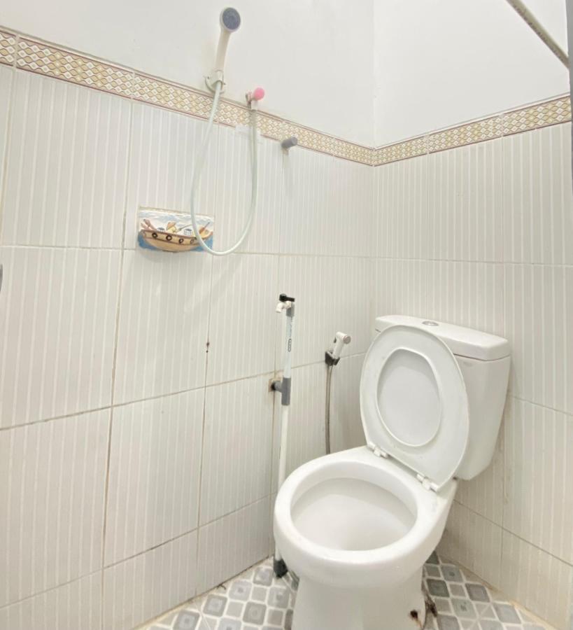Homestay Batu Kelir Syariah Dieng Mitra Reddoorz Diyeng Exterior photo